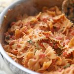 Bowtie Pasta with Salmon, Sundry Tomatoes, Mushroom in a Creamy Sauce